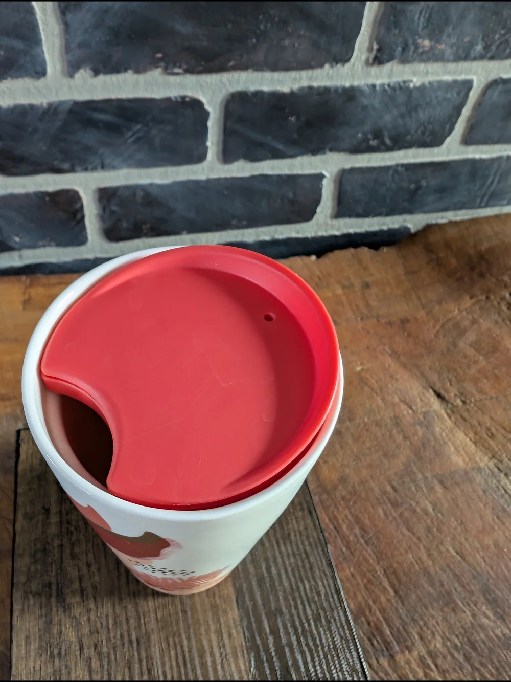 Starbucks White Ceramic Travel Mug with Coral Lid and Pinecone Accent
